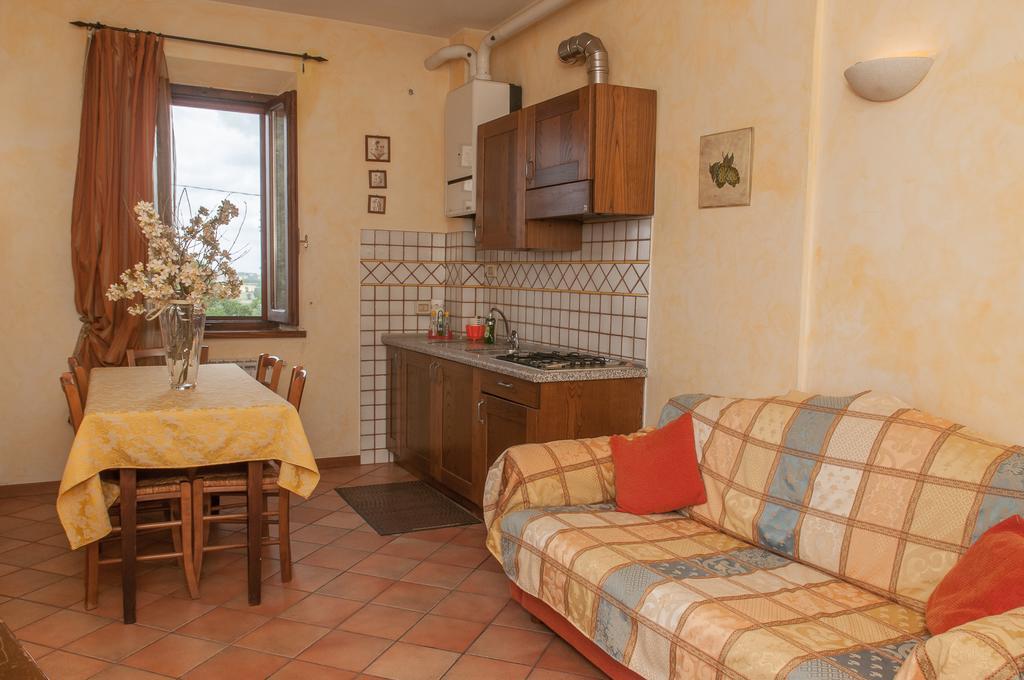 דירות קאסטיגליונה דל לאגו Residenza Il Palazzo חדר תמונה
